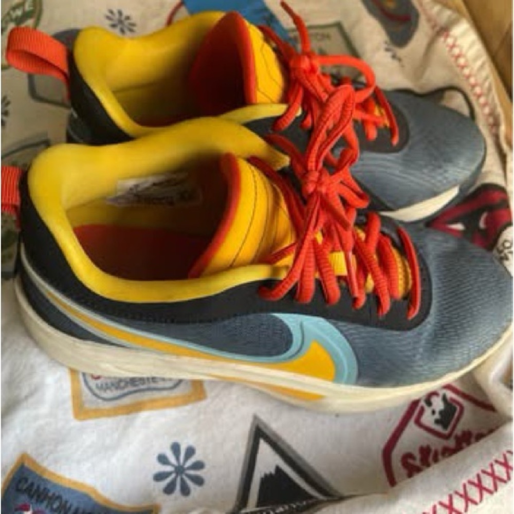 Nike Kids Sneakers in Gray, Orange, and Yellow